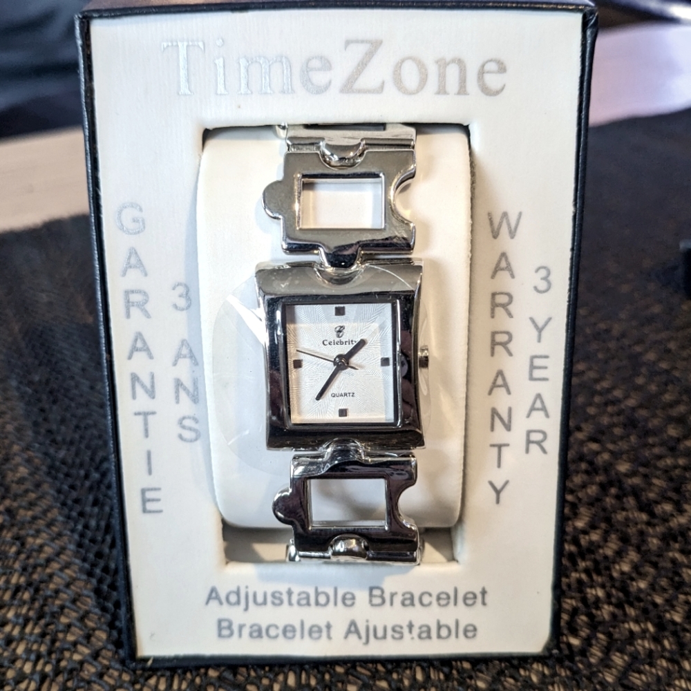 Silver puzzle link adjustable watch